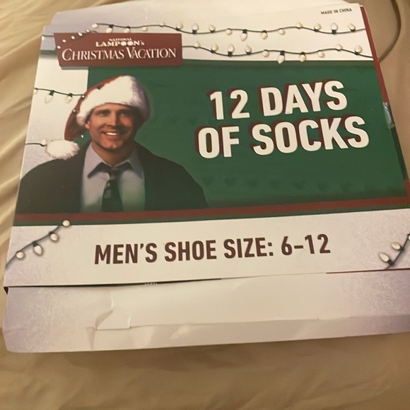 10 pairs of Christmas socks.  Box had 12 but 2 were used 
5 crew 5 no show - Picture 2 of 2